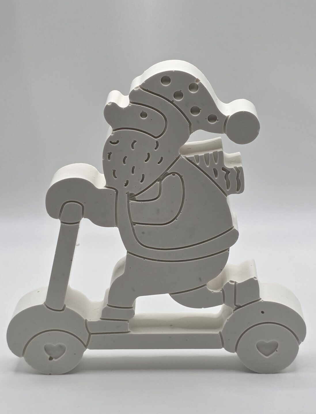 Père Noël en trottinette